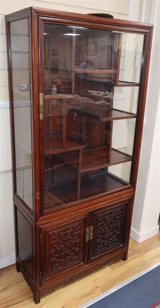 A Chinese rosewood cabinet W.84cm